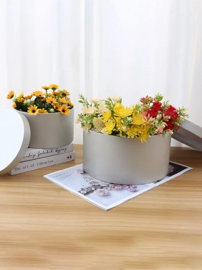 Boite à chapeau argentée